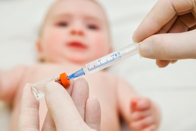 What happens when ex-spouses have opposing views on whether or not to vaccinate their children?