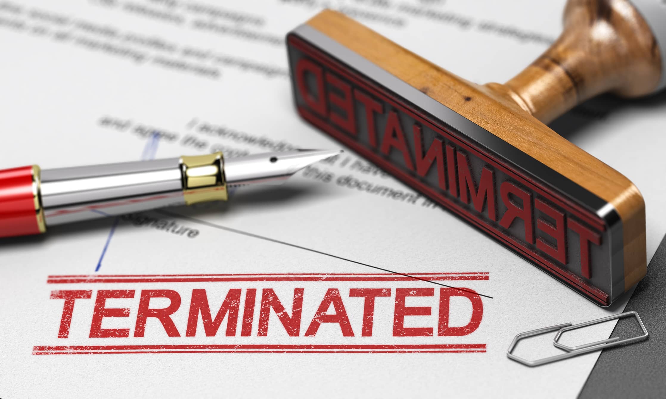 Termination of contract agreement Word Terminated printed on a document