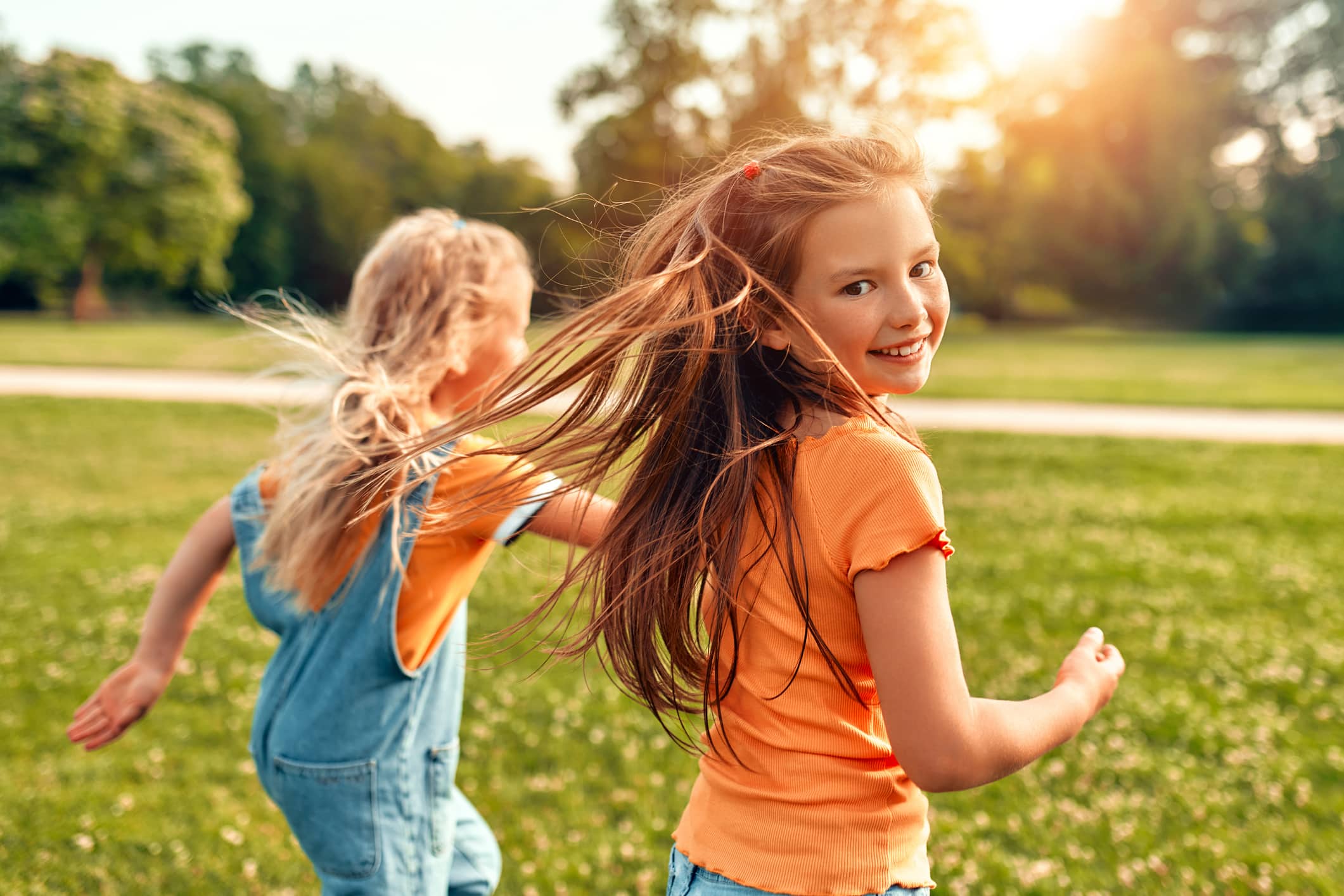 Two girls running