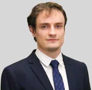 Headshot of Aleksander Shchukin