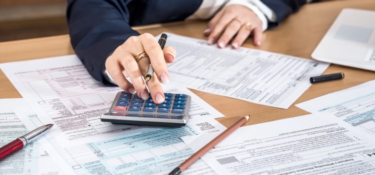Woman filling tax form